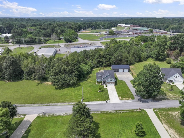10005 Wendy Way, Lyles, TN 37098 - aerial view of property and surrounding area with a heavily wooded area