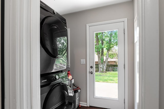 418 Winfrey Dr, Murfreesboro, TN 37130 - laundry room with stacked washer / dryer and baseboards
