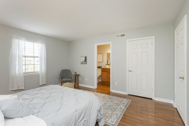 217 Ellington Pl, Madison, TN 37115 - bedroom featuring wood finished floors and ensuite bathroom