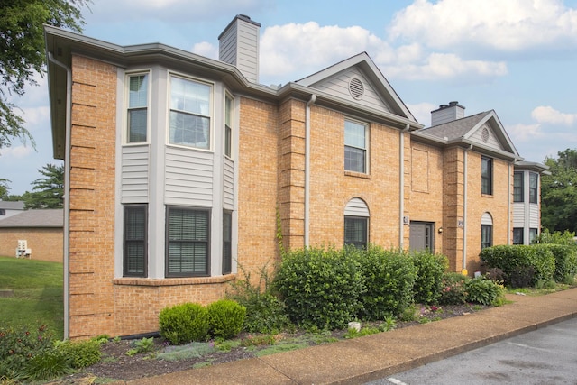 217 Ellington Pl, Madison, TN 37115 - view of front of property featuring brick siding and a chimney