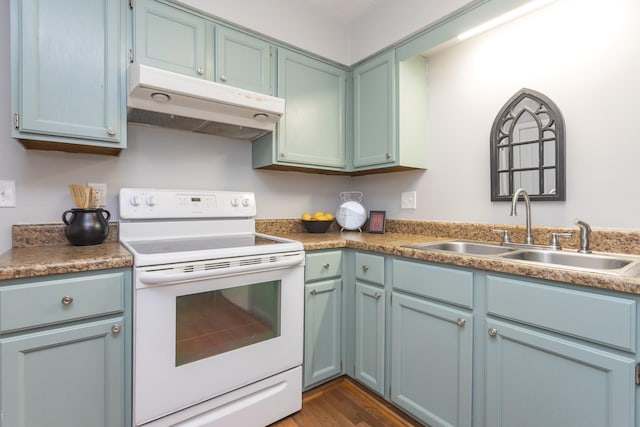 217 Ellington Pl, Madison, TN 37115 - kitchen featuring white electric range oven, under cabinet range hood, and dark wood-style flooring