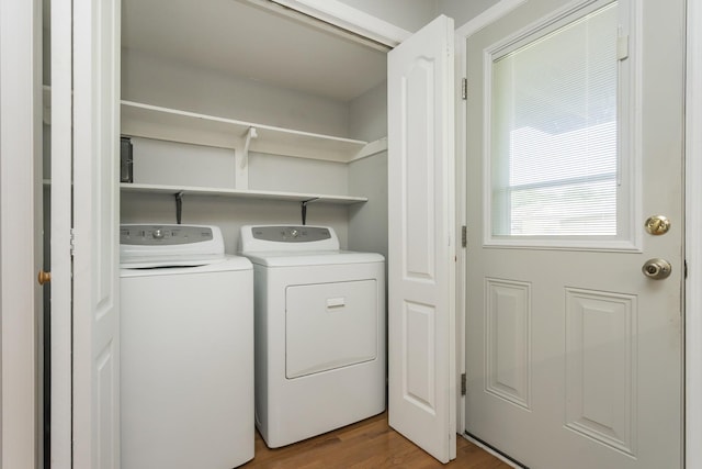 217 Ellington Pl, Madison, TN 37115 - laundry area with wood finished floors and independent washer and dryer