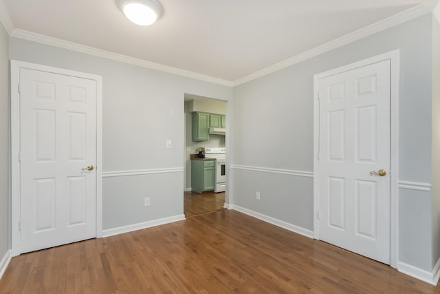 217 Ellington Pl, Madison, TN 37115 - unfurnished bedroom featuring ornamental molding and dark wood-style floors