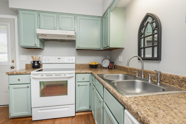 217 Ellington Pl, Madison, TN 37115 - kitchen with electric range, under cabinet range hood, dark wood-style flooring, and green cabinets