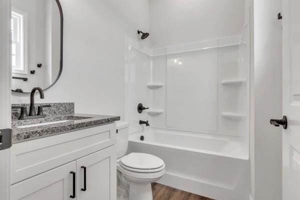 187 Charleston Ave, Pleasant View, TN 37146 - full bath with vanity, wood finished floors, and shower / tub combination