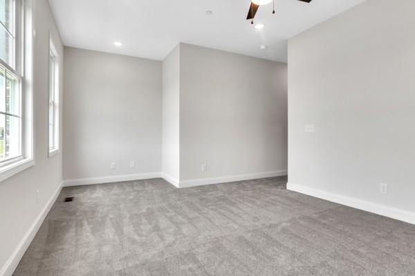 187 Charleston Ave, Pleasant View, TN 37146 - spare room with carpet floors, a ceiling fan, and recessed lighting