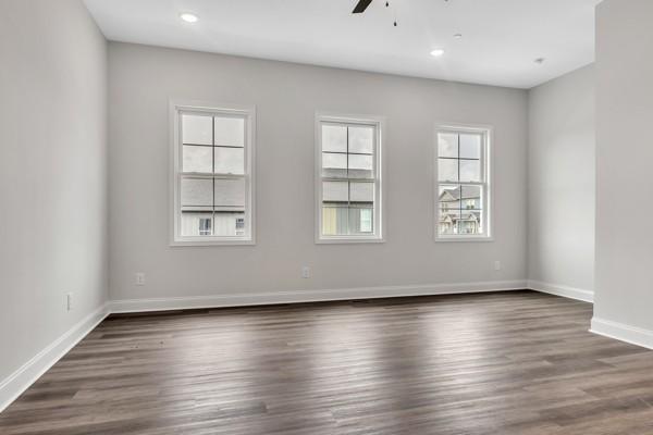 187 Charleston Ave, Pleasant View, TN 37146 - unfurnished room with a ceiling fan, dark wood-style floors, and recessed lighting