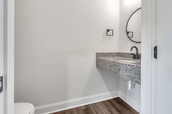 187 Charleston Ave, Pleasant View, TN 37146 - bathroom featuring baseboards and wood finished floors