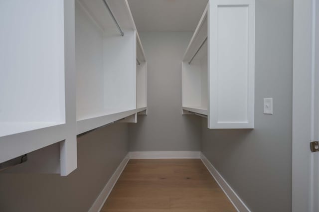 11497 Karo Rd, Bell Buckle, TN 37020 - walk in closet featuring wood finished floors