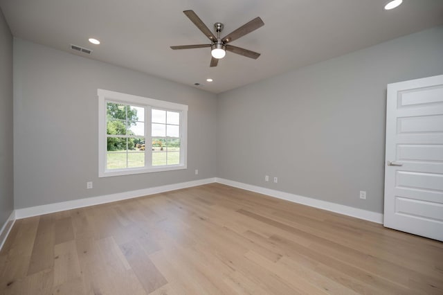 11497 Karo Rd, Bell Buckle, TN 37020 - empty room with light wood-style flooring, a ceiling fan, and recessed lighting