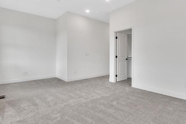 191 Charleston Ave, Pleasant View, TN 37146 - spare room featuring carpet floors and recessed lighting