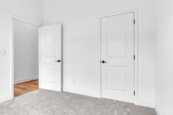 191 Charleston Ave, Pleasant View, TN 37146 - unfurnished bedroom with carpet flooring and baseboards