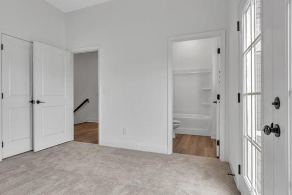 191 Charleston Ave, Pleasant View, TN 37146 - unfurnished bedroom with carpet flooring and connected bathroom