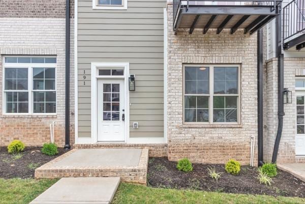191 Charleston Ave, Pleasant View, TN 37146 - doorway to property with brick siding