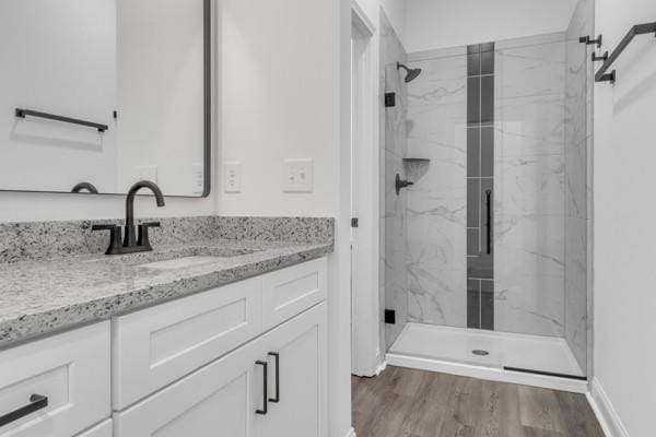 191 Charleston Ave, Pleasant View, TN 37146 - full bath featuring vanity, a marble finish shower, and wood finished floors