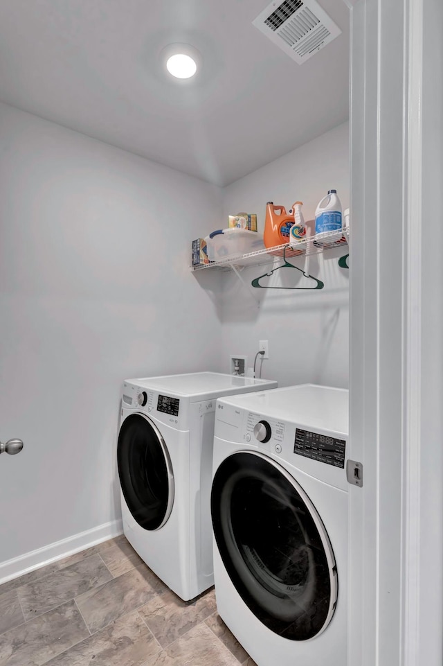 7175 Golden Way, White House, TN 37188 - washroom featuring independent washer and dryer and baseboards