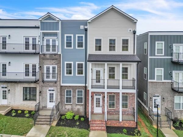199 Charleston Ave, Pleasant View, TN 37146 - townhome / multi-family property featuring french doors and board and batten siding
