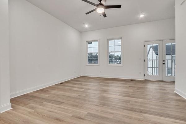 199 Charleston Ave, Pleasant View, TN 37146 - unfurnished room featuring french doors, a ceiling fan, plenty of natural light, light wood-type flooring, and recessed lighting