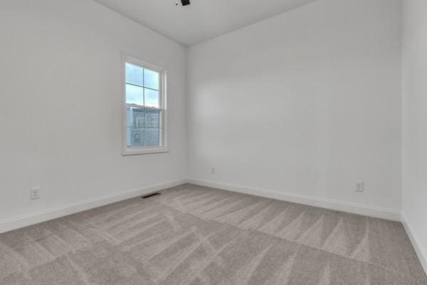199 Charleston Ave, Pleasant View, TN 37146 - empty room featuring light carpet and ceiling fan