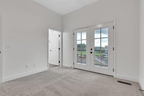 199 Charleston Ave, Pleasant View, TN 37146 - carpeted spare room with french doors