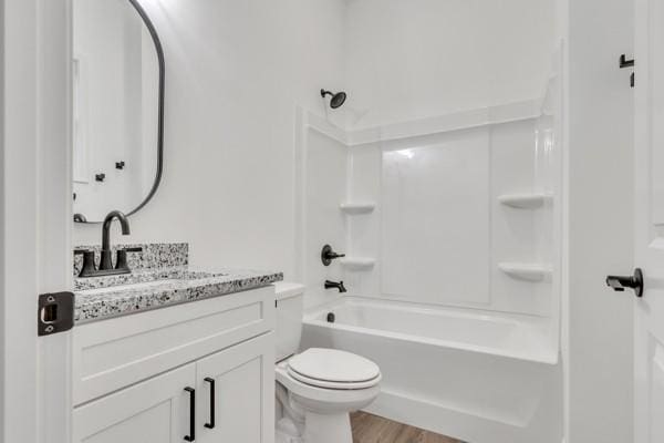 199 Charleston Ave, Pleasant View, TN 37146 - bathroom featuring vanity, wood finished floors, and shower / washtub combination