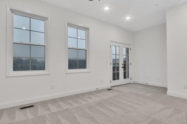 199 Charleston Ave, Pleasant View, TN 37146 - unfurnished room featuring light carpet and recessed lighting