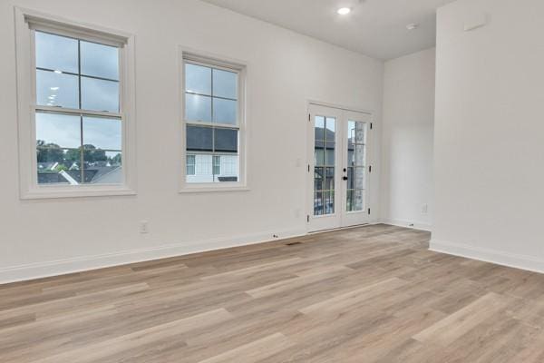 199 Charleston Ave, Pleasant View, TN 37146 - unfurnished room featuring light wood finished floors and french doors