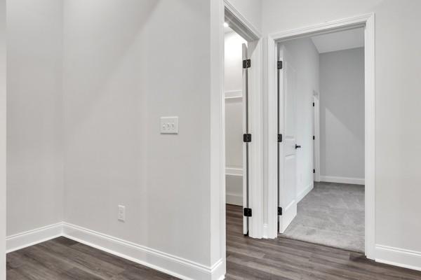 195 Charleston Ave, Pleasant View, TN 37146 - hall featuring dark wood finished floors