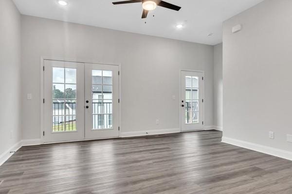 195 Charleston Ave, Pleasant View, TN 37146 - empty room with ceiling fan, french doors, wood finished floors, and recessed lighting
