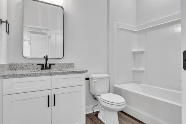 195 Charleston Ave, Pleasant View, TN 37146 - full bathroom with wood finished floors, vanity, and  shower combination