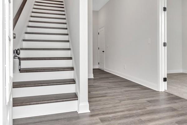 195 Charleston Ave, Pleasant View, TN 37146 - staircase featuring baseboards and wood finished floors