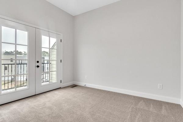 195 Charleston Ave, Pleasant View, TN 37146 - carpeted spare room featuring french doors