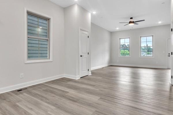 203 Charleston Ave, Pleasant View, TN 37146 - empty room with ceiling fan, wood finished floors, and recessed lighting