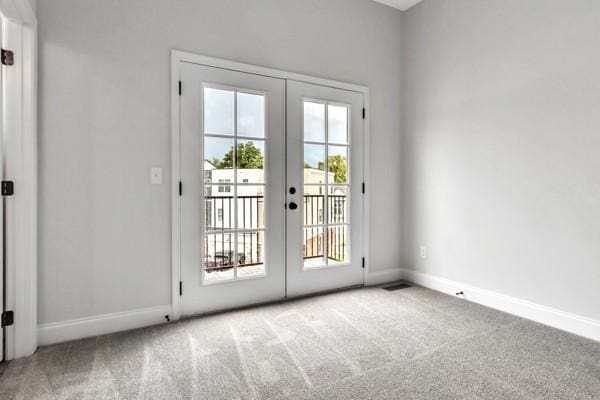 203 Charleston Ave, Pleasant View, TN 37146 - doorway to outside with french doors and carpet