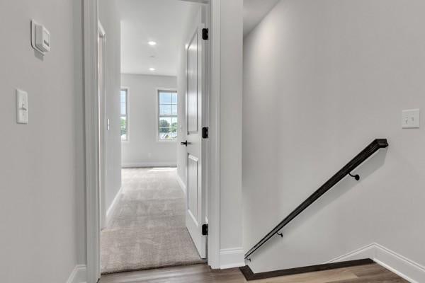 203 Charleston Ave, Pleasant View, TN 37146 - hallway with an upstairs landing and wood finished floors