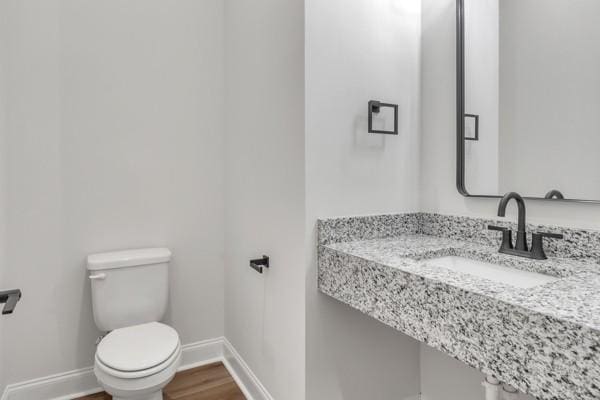 203 Charleston Ave, Pleasant View, TN 37146 - bathroom featuring a sink and wood finished floors