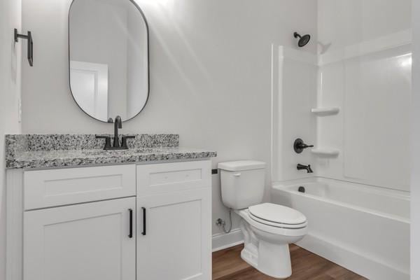 203 Charleston Ave, Pleasant View, TN 37146 - bathroom featuring wood finished floors, vanity, and  shower combination