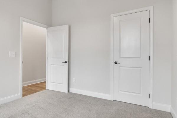203 Charleston Ave, Pleasant View, TN 37146 - unfurnished bedroom with carpet flooring and baseboards