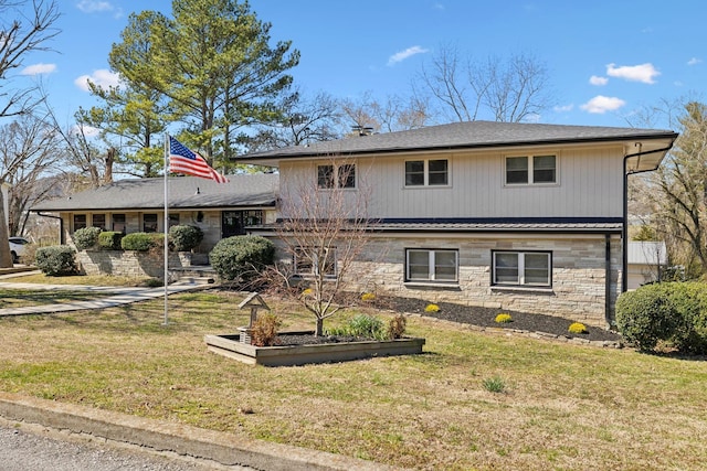 305 Myers Ter, Carthage, TN 37030 - split level home with stone siding and a front yard