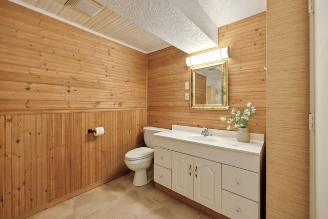 305 Myers Ter, Carthage, TN 37030 - bathroom featuring wooden walls, vanity, tile patterned floors, and a textured ceiling