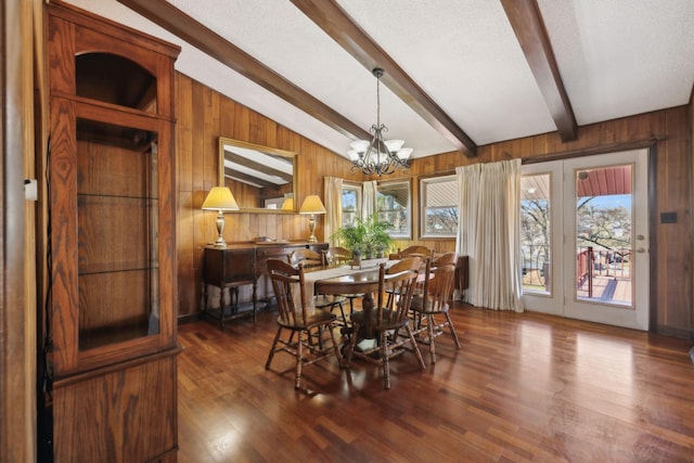 305 Myers Ter, Carthage, TN 37030 - dining area featuring wooden walls, a chandelier, and dark wood-style flooring