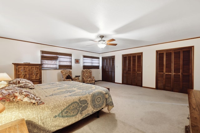 305 Myers Ter, Carthage, TN 37030 - bedroom featuring carpet flooring, ornamental molding, two closets, and ceiling fan