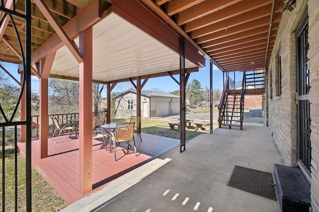 305 Myers Ter, Carthage, TN 37030 - view of patio with stairs, a deck, outdoor dining space, and an outbuilding