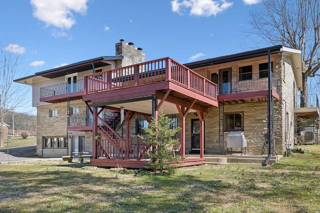 305 Myers Ter, Carthage, TN 37030 - back of house featuring a chimney, a yard, and stone siding