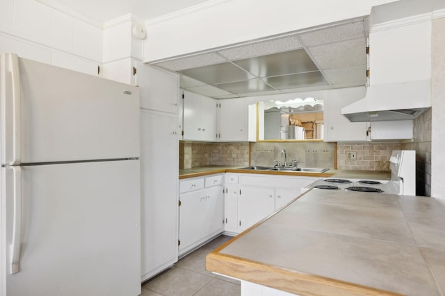 305 Myers Ter, Carthage, TN 37030 - kitchen featuring white appliances, premium range hood, decorative backsplash, and white cabinetry