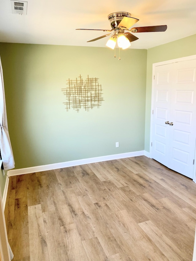 1808 Luke Ct, Columbia, TN 38401 - unfurnished bedroom featuring wood finished floors and ceiling fan