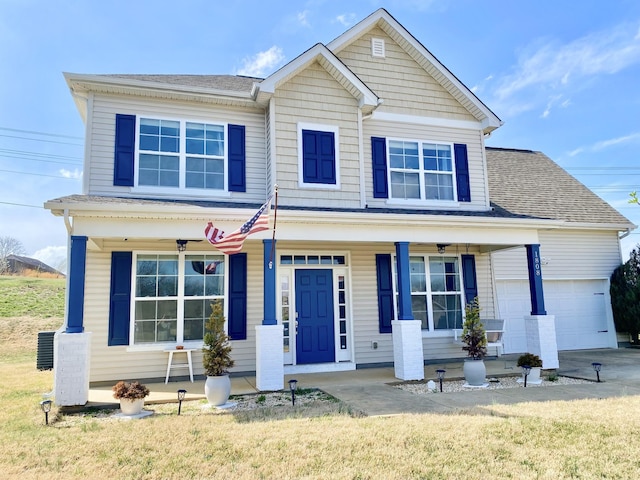 1808 Luke Ct, Columbia, TN 38401 - view of front of property with a porch, a front lawn, an attached garage, and a shingled roof