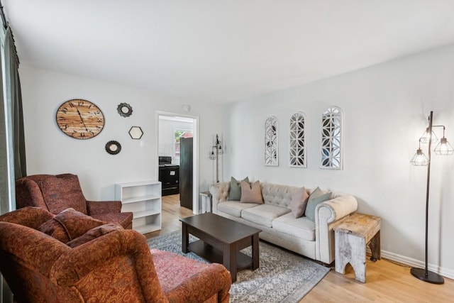 3721 Wharton Dr, Nashville, TN 37211 - living room featuring light wood-type flooring and baseboards