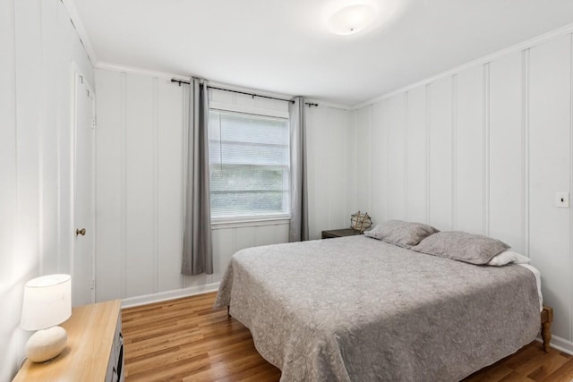 3721 Wharton Dr, Nashville, TN 37211 - bedroom with a decorative wall and light wood-style floors