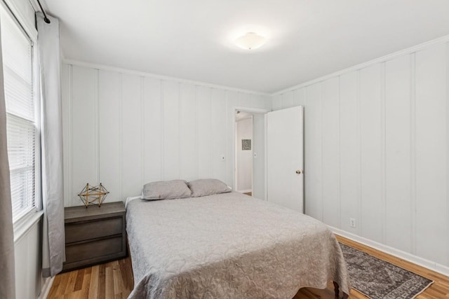 3721 Wharton Dr, Nashville, TN 37211 - bedroom featuring wood finished floors and a decorative wall